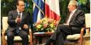 Francois Hollande y Raúl Castro