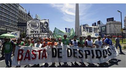 Macri se abre al FMI y los niños a la pobreza